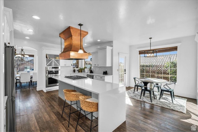 470 E 130 S, Ivins, UT 84738 - kitchen featuring a notable chandelier, light countertops, white cabinetry, and pendant lighting