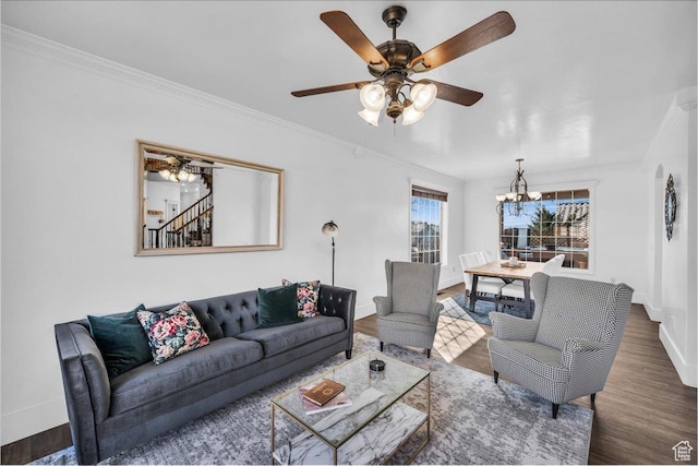 470 E 130 S, Ivins, UT 84738 - living area featuring ceiling fan with notable chandelier, baseboards, stairs, dark wood finished floors, and crown molding