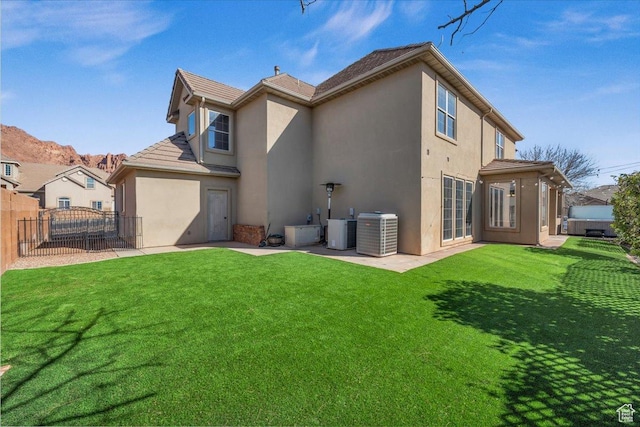 470 E 130 S, Ivins, UT 84738 - back of house featuring a patio, central air condition unit, fence, and stucco siding
