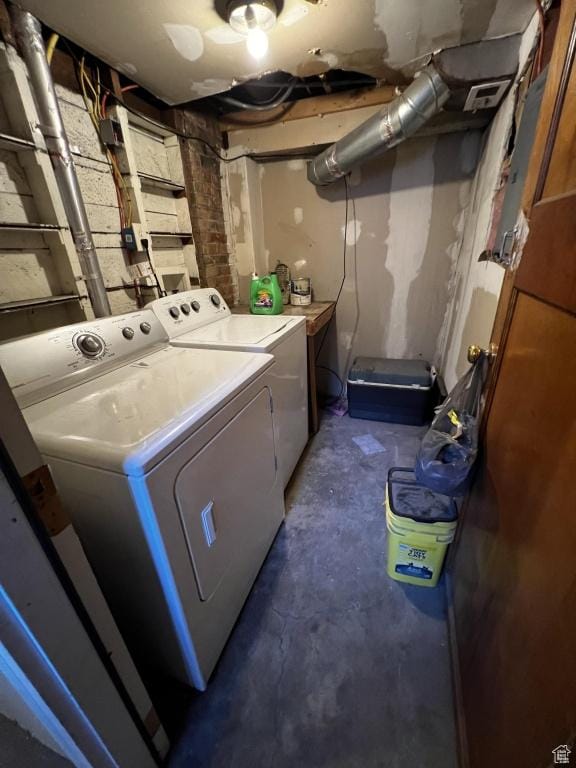 laundry area featuring laundry area, visible vents, and separate washer and dryer