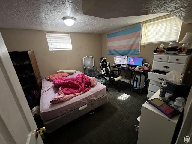 bedroom with a textured ceiling