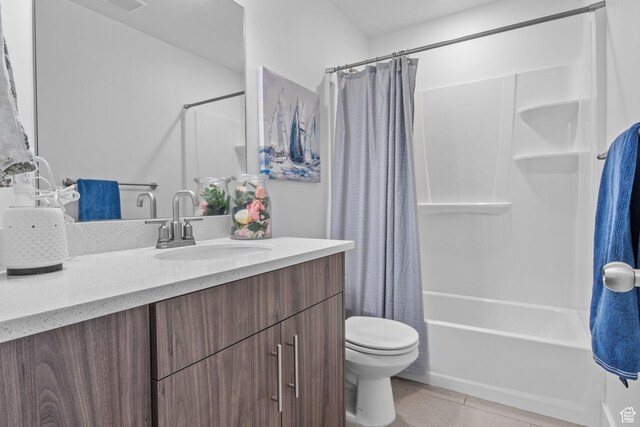 6471 S Aspen Ln, South Weber, UT 84405 - full bath with tile patterned floors, toilet, vanity, and shower / tub combo with curtain