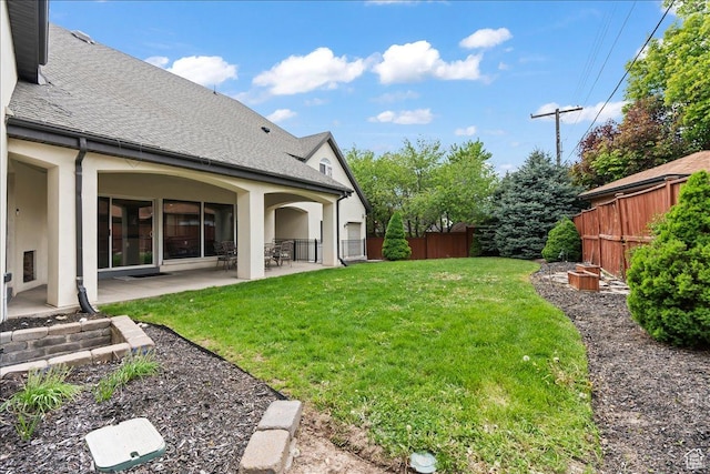 view of yard featuring a fenced backyard and a patio area