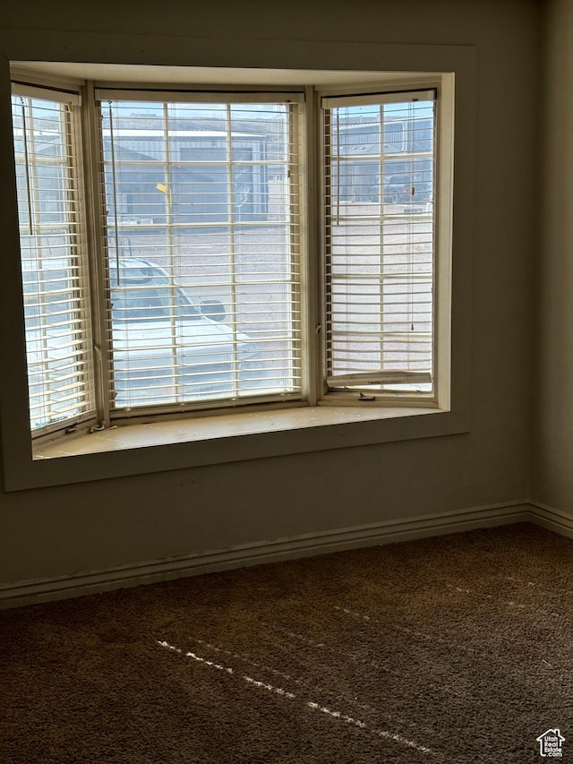 2573 S 2800 W, Roosevelt, UT 84066 - empty room with a healthy amount of sunlight, carpet, and baseboards