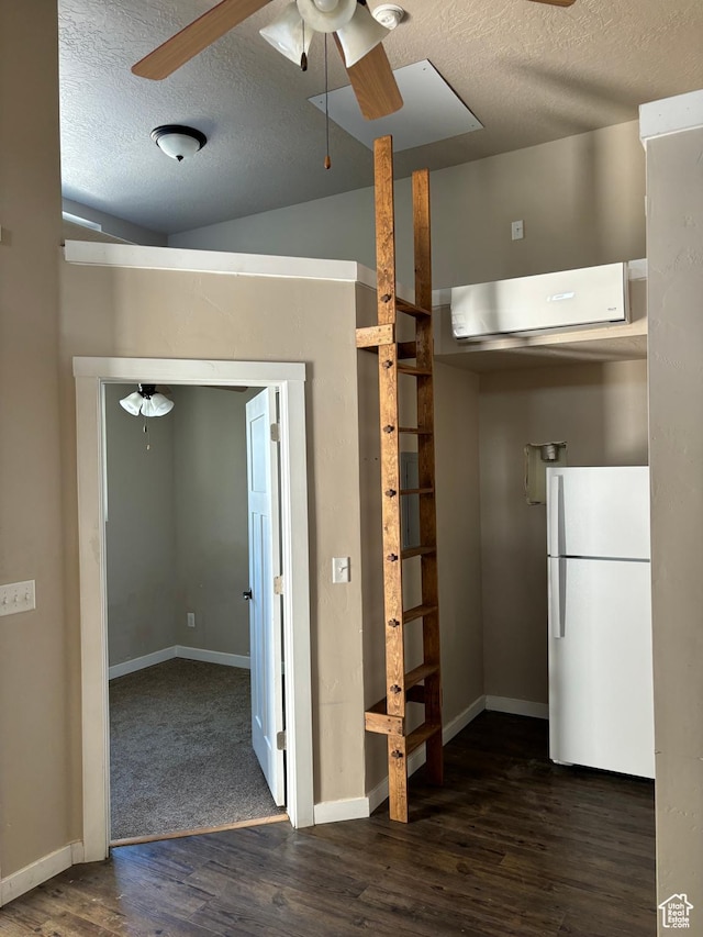 2573 S 2800 W, Roosevelt, UT 84066 - kitchen with dark wood-style floors, freestanding refrigerator, ceiling fan, and a textured ceiling
