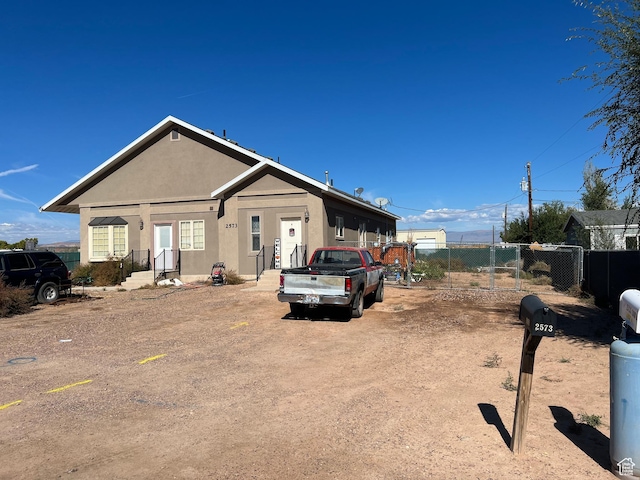 2573 S 2800 W, Roosevelt, UT 84066 - view of front of house featuring fence and stucco siding