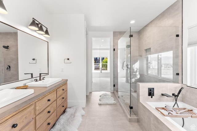 615 N Haystack Mountain Dr, Heber City, UT 84032 - full bath featuring double vanity, tile patterned floors, a garden tub, a shower stall, and a sink