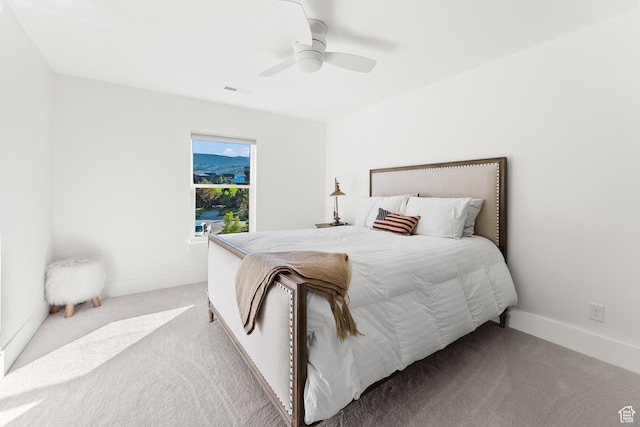 615 N Haystack Mountain Dr, Heber City, UT 84032 - bedroom featuring light carpet, visible vents, a ceiling fan, and baseboards