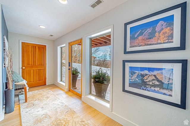4414 Hidden Cove Rd, Park City, UT 84098 - foyer featuring light wood-style floors, recessed lighting, visible vents, and baseboards