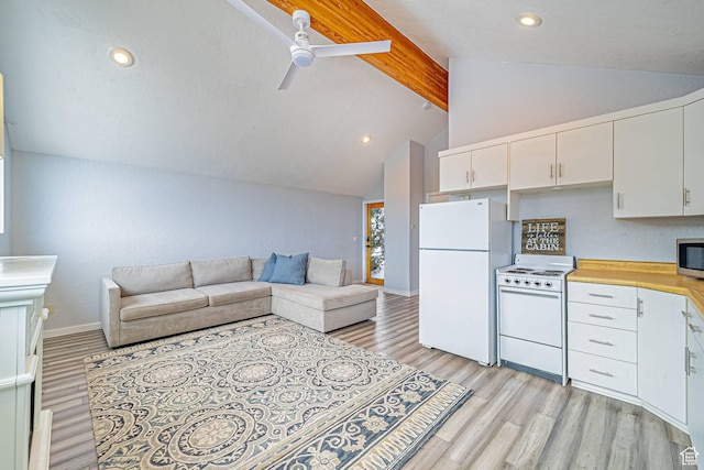 4414 Hidden Cove Rd, Park City, UT 84098 - kitchen with white appliances, light countertops, open floor plan, and white cabinetry