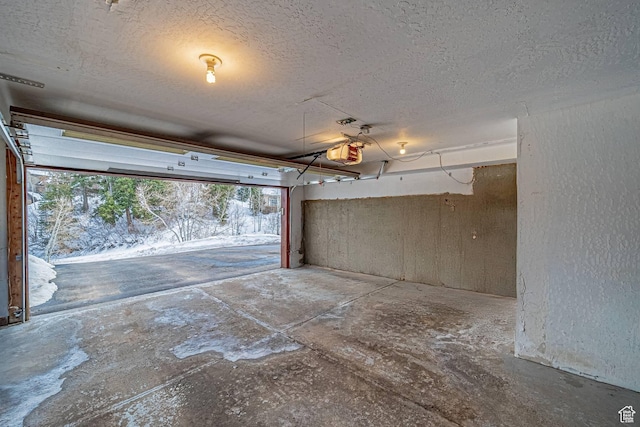 4414 Hidden Cove Rd, Park City, UT 84098 - garage with a garage door opener and a textured wall