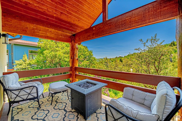 4414 Hidden Cove Rd, Park City, UT 84098 - view of patio / terrace with an outdoor living space with a fire pit
