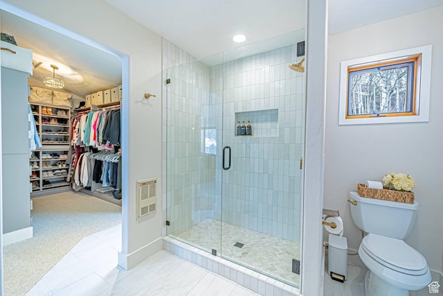 4414 Hidden Cove Rd, Park City, UT 84098 - bathroom with baseboards, toilet, a spacious closet, and a shower stall
