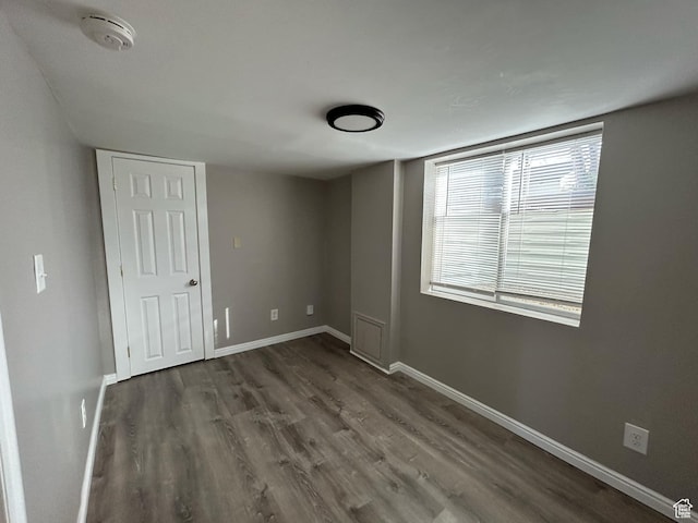 330 E 300 N, Price, UT 84501 - unfurnished bedroom featuring baseboards and wood finished floors