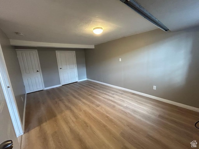 330 E 300 N, Price, UT 84501 - unfurnished bedroom featuring baseboards and wood finished floors