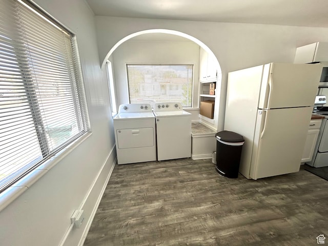 330 E 300 N, Price, UT 84501 - washroom with arched walkways, dark wood-style floors, and washer and dryer