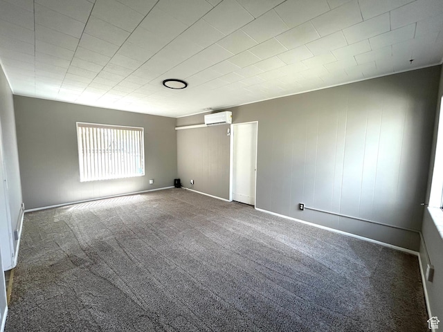 330 E 300 N, Price, UT 84501 - empty room featuring an AC wall unit, baseboards, and carpet
