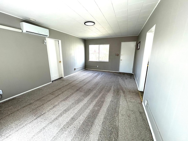 330 E 300 N, Price, UT 84501 - empty room featuring carpet, baseboards, and a wall unit AC