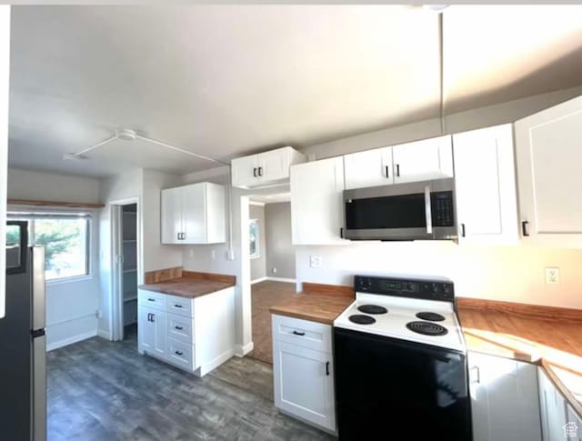 330 E 300 N, Price, UT 84501 - kitchen with wood counters, stainless steel appliances, white cabinets, and dark wood-type flooring