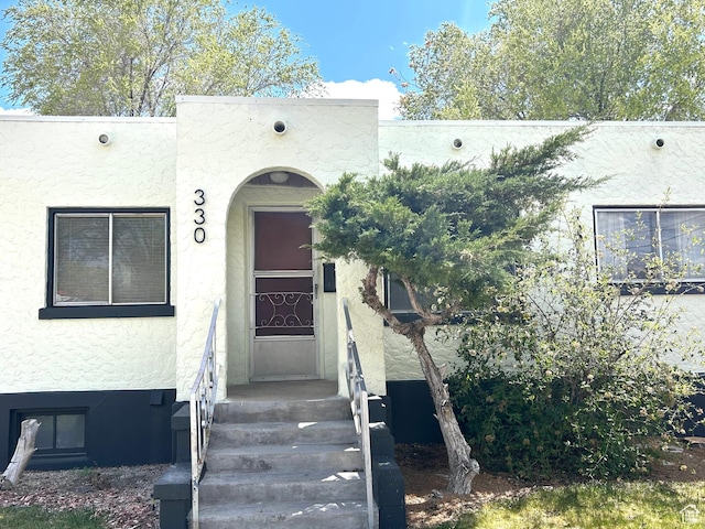 330 E 300 N, Price, UT 84501 - entrance to property featuring stucco siding
