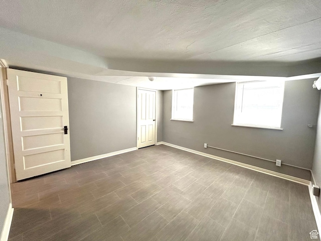 330 E 300 N, Price, UT 84501 - below grade area featuring baseboards and a textured ceiling