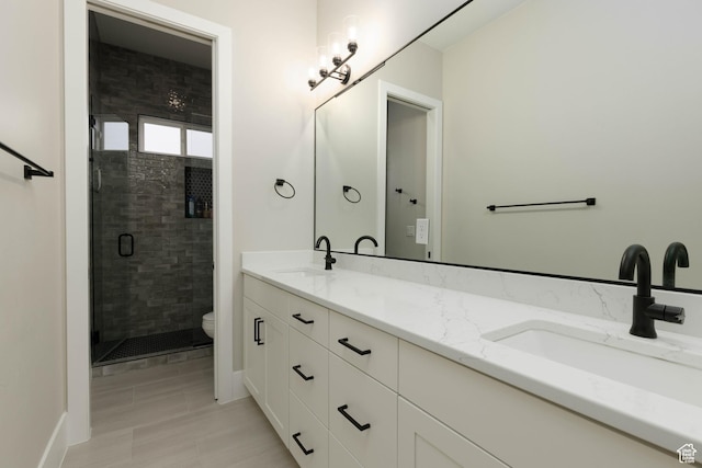 3311 E Barrel Roll Dr, St George, UT 84790 - full bath with double vanity, a sink, toilet, and a shower stall