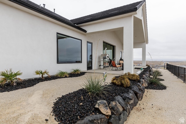 3311 E Barrel Roll Dr, St George, UT 84790 - exterior space featuring a patio, fence, and stucco siding