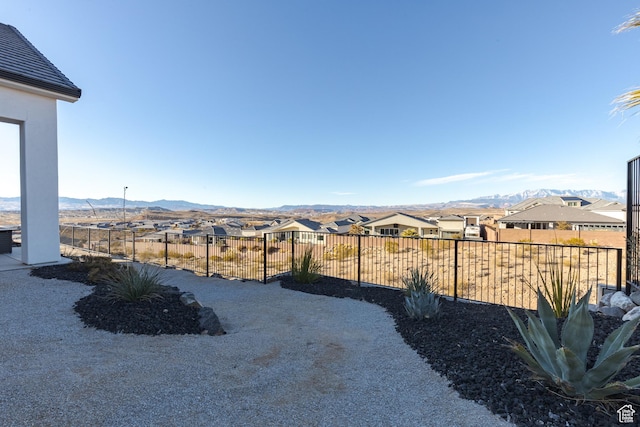 3311 E Barrel Roll Dr, St George, UT 84790 - view of yard with a mountain view, fence, and a residential view
