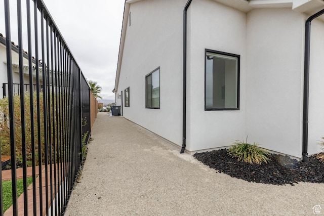 3311 E Barrel Roll Dr, St George, UT 84790 - view of home's exterior with fence and stucco siding