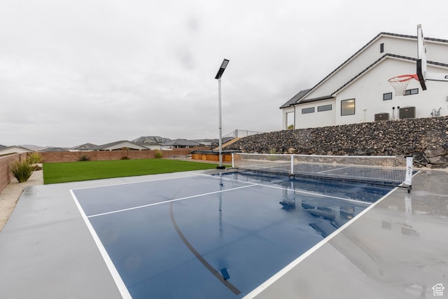 3311 E Barrel Roll Dr, St George, UT 84790 - view of sport court with community basketball court, a lawn, fence, and a residential view