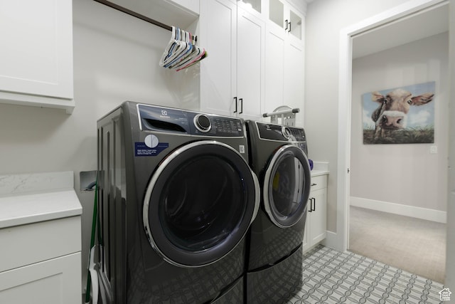 3311 E Barrel Roll Dr, St George, UT 84790 - clothes washing area featuring cabinet space, baseboards, and washer and clothes dryer
