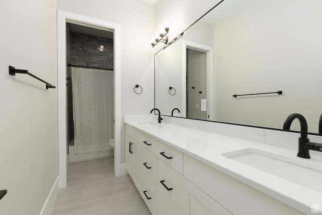 3311 E Barrel Roll Dr, St George, UT 84790 - full bath with toilet, shower / bath combination with curtain, double vanity, and a sink