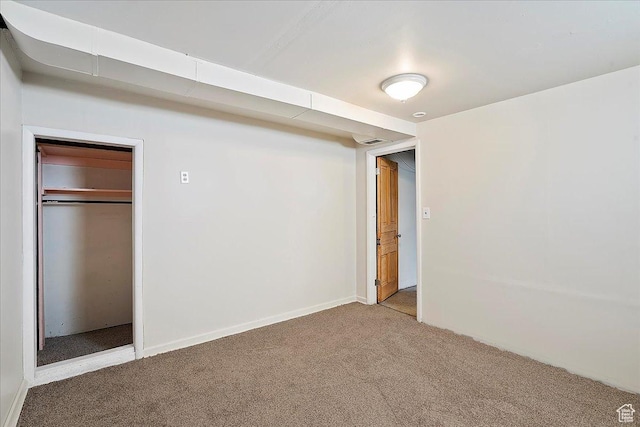 867 33rd St, Ogden, UT 84403 - unfurnished bedroom with a closet and carpet flooring