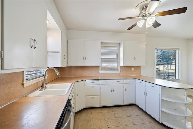 867 33rd St, Ogden, UT 84403 - kitchen with plenty of natural light, white cabinets, light countertops, open shelves, and a sink