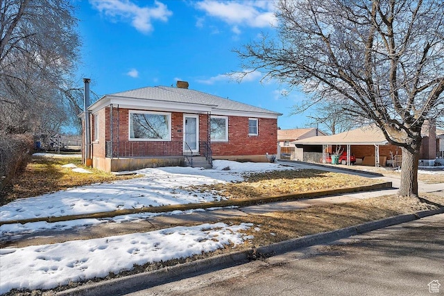 867 33rd St, Ogden, UT 84403 - bungalow-style house featuring a chimney and brick siding