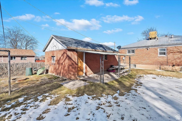 867 33rd St, Ogden, UT 84403 - snow covered house with brick siding