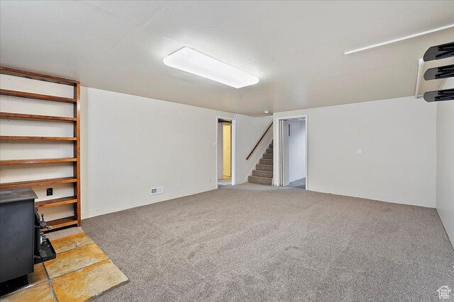 867 33rd St, Ogden, UT 84403 - finished basement featuring carpet floors, visible vents, and stairway