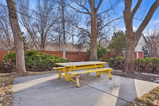 view of patio / terrace with outdoor dining area and fence