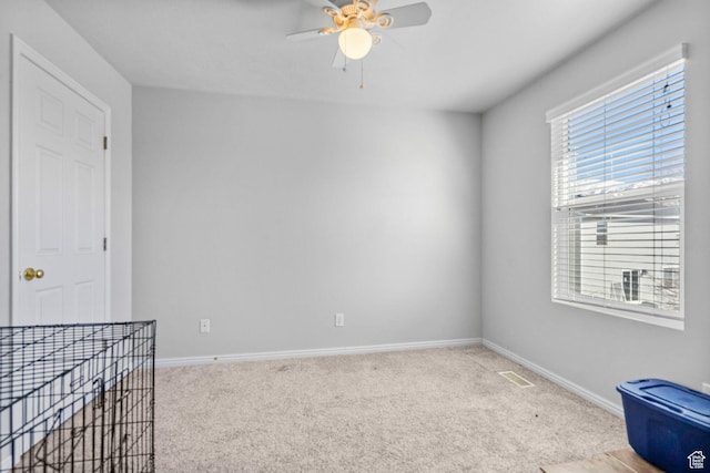 1486 S Archmore Loop, Springville, UT 84663 - unfurnished room featuring baseboards, ceiling fan, visible vents, and light colored carpet