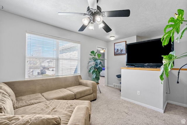 1486 S Archmore Loop, Springville, UT 84663 - living area featuring visible vents, ceiling fan, light carpet, and a textured ceiling