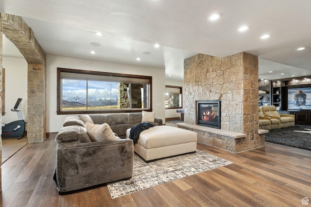 3203 E Kings Crest Ct, Heber City, UT 84032 - living room with recessed lighting, a fireplace, and wood finished floors