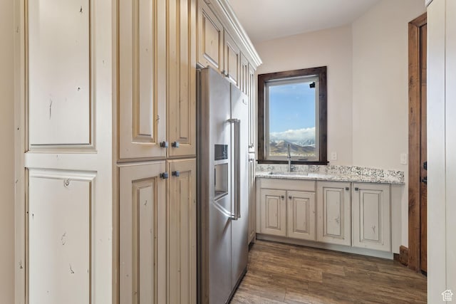 3203 E Kings Crest Ct, Heber City, UT 84032 - kitchen with high end refrigerator, dark wood-style floors, light stone counters, cream cabinetry, and a sink