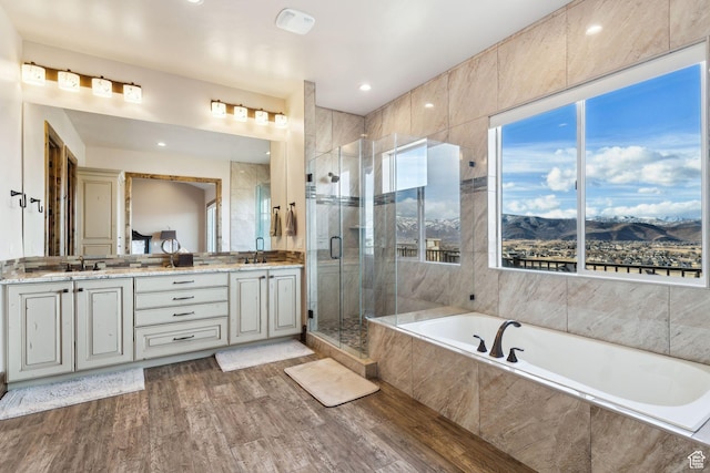 3203 E Kings Crest Ct, Heber City, UT 84032 - full bath featuring double vanity, a stall shower, a sink, and wood finished floors