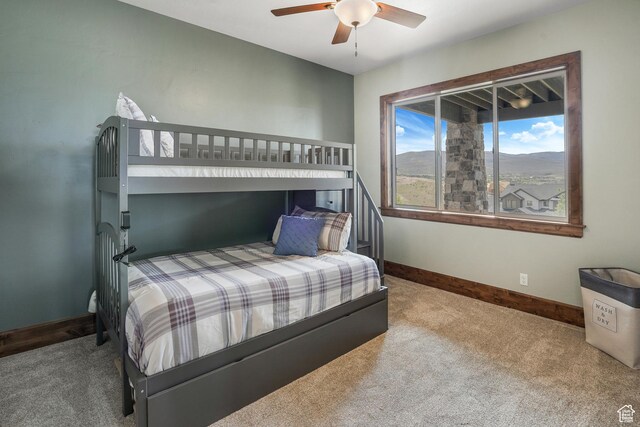 3203 E Kings Crest Ct, Heber City, UT 84032 - carpeted bedroom featuring a mountain view, baseboards, and ceiling fan