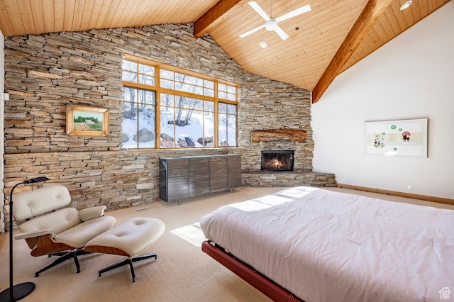 2667 Aspen Springs Dr, Park City, UT 84060 - bedroom with high vaulted ceiling, carpet, wood ceiling with exposed beams, and a stone fireplace