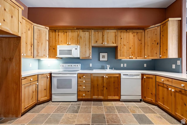 2667 Aspen Springs Dr, Park City, UT 84060 - kitchen featuring white appliances, a sink, and stone tile floors