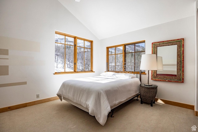 2667 Aspen Springs Dr, Park City, UT 84060 - carpeted bedroom with baseboards, multiple windows, and high vaulted ceiling