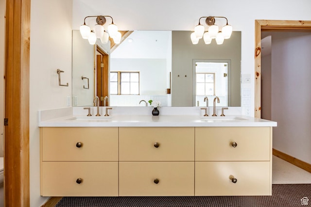 2667 Aspen Springs Dr, Park City, UT 84060 - bathroom featuring double vanity, toilet, and a chandelier
