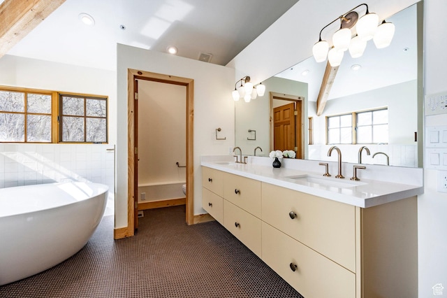 2667 Aspen Springs Dr, Park City, UT 84060 - bathroom featuring a soaking tub, double vanity, toilet, and recessed lighting