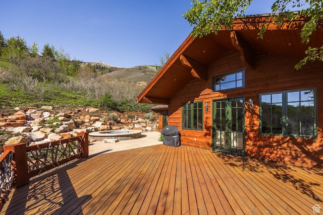 2667 Aspen Springs Dr, Park City, UT 84060 - wooden terrace with a hot tub, a mountain view, and a grill